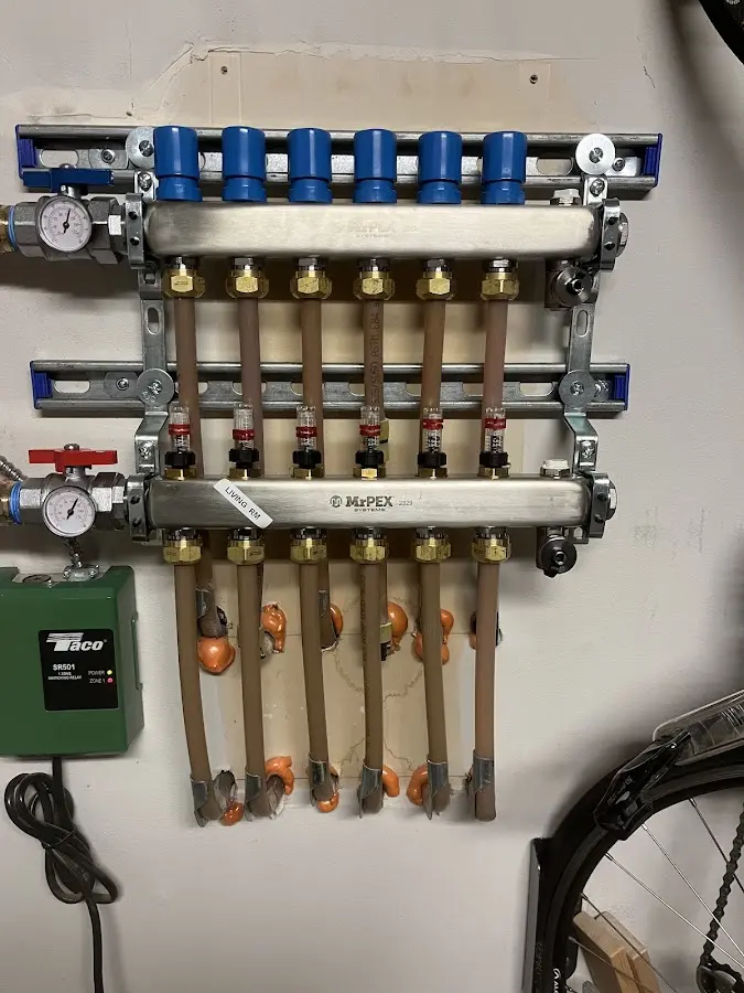 Plumber performing Water Heater Repair at a residential property in Harborcreek